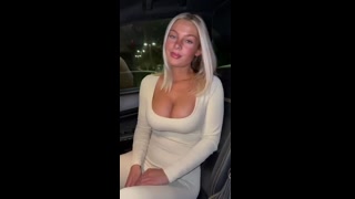 The young blonde pops out her tits on the road